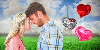 Composite image of attractive couple standing touching heads