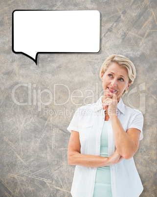 Composite image of happy mature blonde thinking with hand on chi