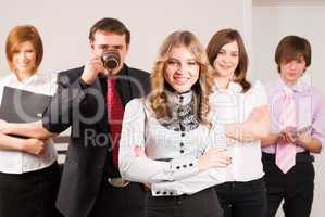 Attractive business lady and her team
