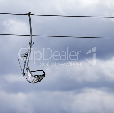 Chair lift and overcast gray sky