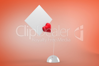 Composite image of heart paper holder