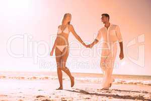 Pretty blonde walking away from man holding her hand