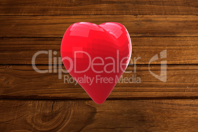 Bright red heart shaped balloon