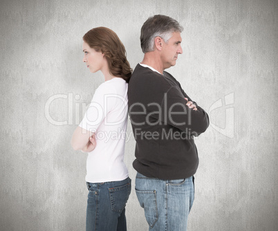 Composite image of casual couple not speaking after fight