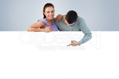 Composite image of smiling young female with her boyfriend behin