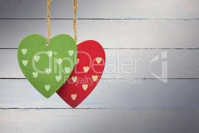 Composite image of cute heart decorations