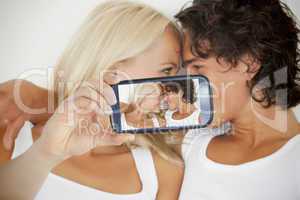 Couple taking selfie on smartphone