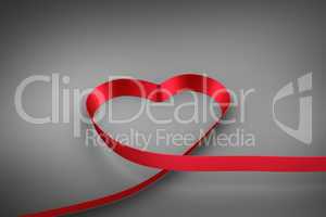 Red ribbon in a heart shape