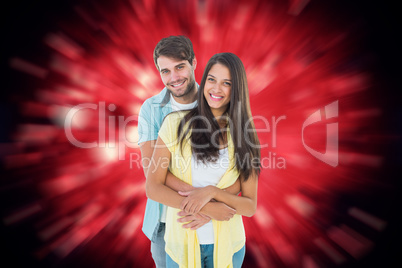 Composite image of happy casual couple smiling at camera