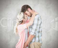 Composite image of attractive young couple about to kiss