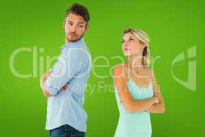 Composite image of unhappy couple not speaking to each other