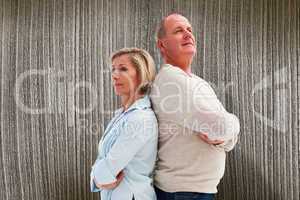 Composite image of mature couple standing and thinking