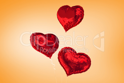 Composite image of love heart balloons