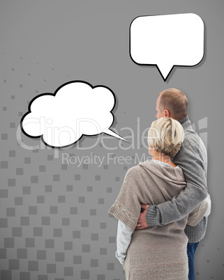 Composite image of happy mature couple in winter clothes