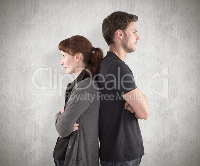 Composite image of irritated couple ignoring each other