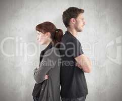 Composite image of irritated couple ignoring each other