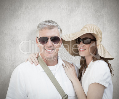 Composite image of vacationing couple