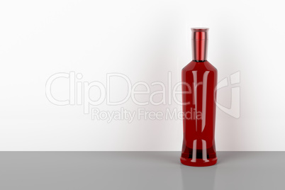 Red alcohol bottle