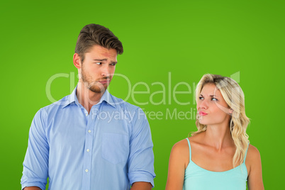 Composite image of young couple making silly faces