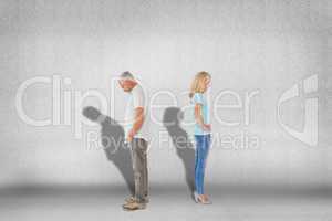 Composite image of unhappy couple not speaking to each other