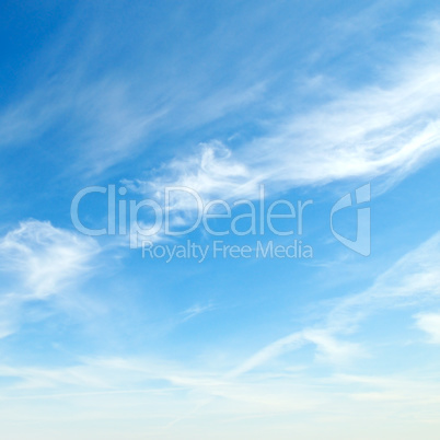 white fluffy clouds in the blue sky