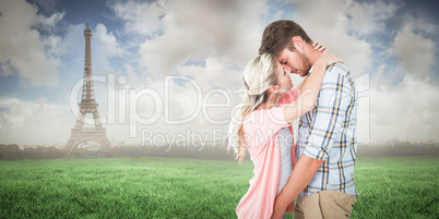 Composite image of attractive young couple about to kiss