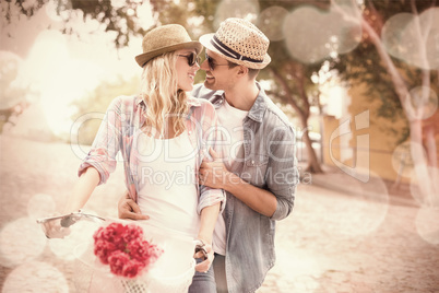 Hip young couple going for a bike ride