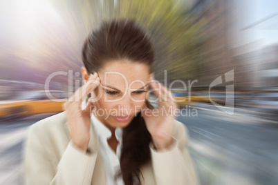Composite image of woman with headache