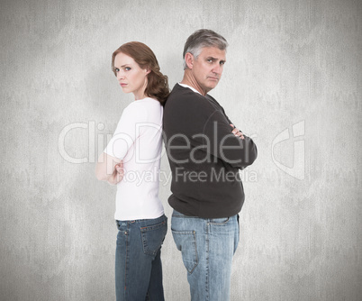 Composite image of casual couple not speaking after fight