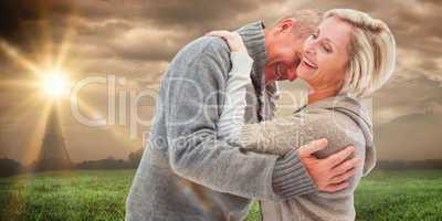 Composite image of happy mature couple in winter clothes