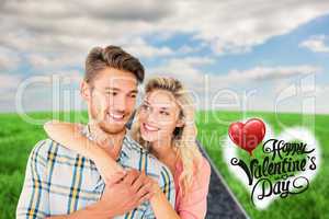 Composite image of attractive couple embracing and smiling