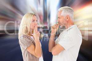 Composite image of couple staying silent with fingers on lips