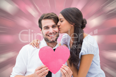 Composite image of pretty brunette giving boyfriend a kiss and h