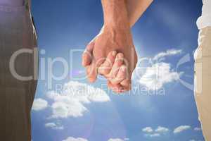 Composite image of happy senior couple holding hands