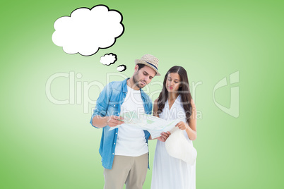 Composite image of lost hipster couple looking at map