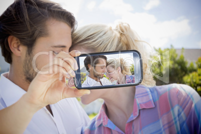 Couple taking selfie on smartphone