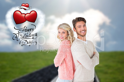 Composite image of attractive couple smiling with arms crossed Composite image of attractive couple smiling with arms crossed