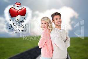 Composite image of attractive couple smiling with arms crossed