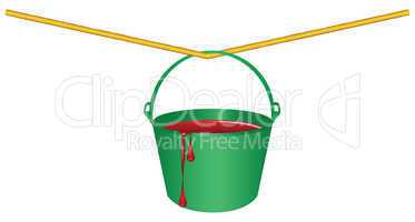 Green bucket with red paint