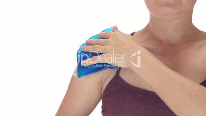 Woman Puts Cold Pack on Shoulder Front View