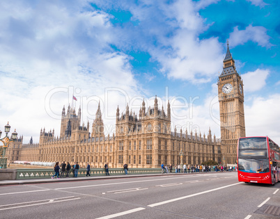 Red Double Decker Bus crossing Westminster Bridge, London, UK