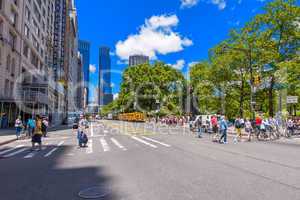 NEW YORK CITY - JUNE 10, 2013: Tourists walk near Columbus Circl