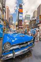 NEW YORK CITY - JUNE 12, 2013: Vintage car in Times Square on a