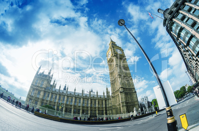 LONDON - SEPTEMBER 28, 2013: Tourists walk under Big Ben. More t