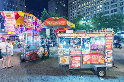 NEW YORK CITY - JUNE 12, 2013: New York street seller in a Manha