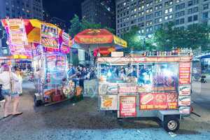 NEW YORK CITY - JUNE 12, 2013: New York street seller in a Manha