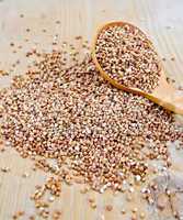 Buckwheat with spoon on board