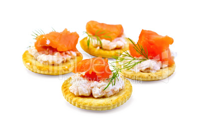 Cracker with cream and salmon