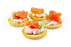 Cracker with cream and salmon