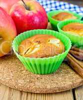 Cupcake with apples on board